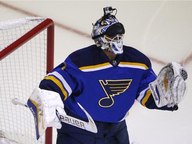 St. Louis Blues goalie Brian Elliott, a member of Team Foligno, wears a blindfold while participating in the breakaway contest during the NHL All-Star hockey skills competition in Columbus, Ohio, Saturday, Jan. 24, 2015.