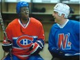 A Twitter picture shows actor Marc St-Martin, left, with his face painted black, doing an impersonation of Montreal Canadiens' P.K. Subban, during Théatre du Rideau Vert year in review show 2014 Revue et Corrigée.