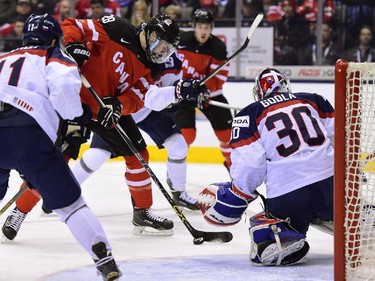 Canada's Lawson Crouse (28) attempts to get one past Slovakia's Denis Godla during second period semifinal hockey action at the IIHF World Junior Championship in Toronto on Sunday, Jan.4, 2015.