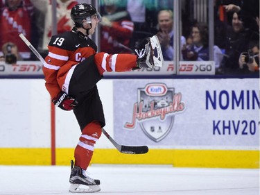 Canada's Nic Petan (19) celebrates after scoring his third goal of the game during the third period of semifinal hockey action against Slovakia at the IIHF World Junior Championship in Toronto on Sunday, Jan.4, 2015.