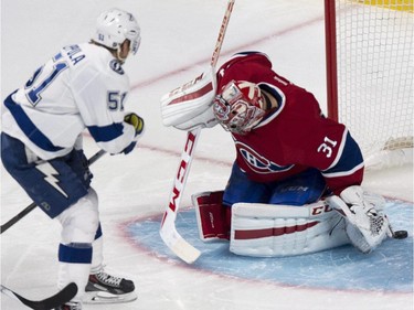 Montreal Canadiens goalie Carey Price makes a save off Tampa Bay Lightning's Valtteri Filppula during first period NHL hockey action Tuesday, January 6, 2015 in Montreal.