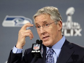 Seattle Seahawks head coach Pete Carroll answers a question at a news conference for NFL Super Bowl XLIX football game Sunday, Jan. 25, 2015, in Phoenix. The Seahawks play the New England Patriots in Super Bowl XLIX on Sunday, Feb. 1, 2015. (AP Photo/David J. Phillip)