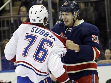 New York Rangers left wing Chris Kreider (20) and Montreal Canadiens defenseman P.K. Subban (76) fight during the first period of an NHL hockey game Thursday, Jan. 29, 2015 at Madison Square Garden in New York.