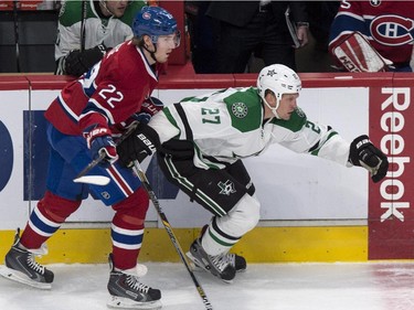 Dallas Stars' Travis Moen breaks away from Montreal Canadiens' Dale Weise during first period NHL hockey action Tuesday, January 27, 2015 in Montreal.