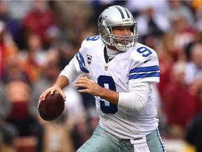 Dallas Cowboys quarterback Tony Romo looks to pass against the Washington Redskins during NFL game on Dec. 28, 2014.