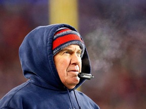 New England Patriots head coach Bill Belichick looks on from the sideline during playoff game against the Baltimore Ravens at Gillette Stadium on Jan. 10, 2015 in Foxboro, Mass.
