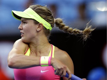 Eugenie Bouchard of Canada plays a shot to Kiki Bertens of the Netherlands during their second round match at the Australian Open tennis championship in Melbourne, Australia, Wednesday, Jan. 21, 2015.
