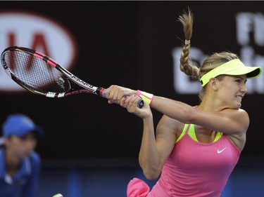 Eugenie Bouchard of Canada plays a shot to Kiki Bertens of the Netherlands during their second round match at the Australian Open tennis championship in Melbourne, Australia, Wednesday, Jan. 21, 2015.