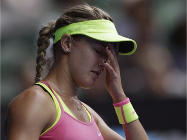 Eugenie Bouchard of Canada reacts as she plays Maria Sharapova of Russia during their quarterfinal match at the Australian Open tennis championship in Melbourne, Australia, Tuesday, Jan. 27, 2015.