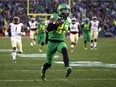 Oregon wide receiver Darren Carrington scores touchdown against Florida State during Rose Bowl game in Pasadena, Calif., on Jan. 1, 2015.