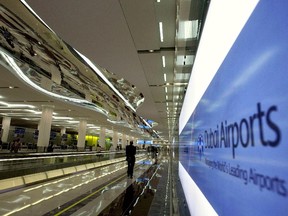 A man walks toward the departure lounge at Dubai International Airport's Terminal 3 in 2008.