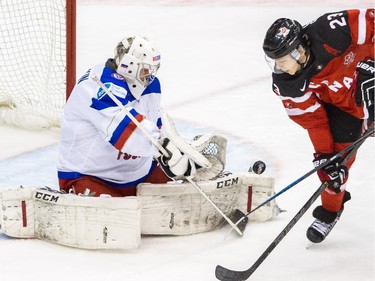 Sam Reinhart (#23) of Canada fires a shot against Igor Shestyorkin #30 of Russia during the Gold medal game of the 2015 IIHF World Junior Championship on January 05, 2015 at the Air Canada Centre in Toronto, Ontario, Canada.