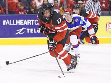 Connor McDavid (#17) of Team Canada skates in on a break away goal against Team Russia during the Gold medal game in the 2015 IIHF World Junior Hockey Championship at the Air Canada Centre on January 5, 2015 in Toronto, Ontario, Canada.