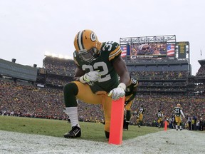 Green Bay Packers safety Chris Banjo takes a quiet moment before NFL playoff game against the Dallas Cowboys on Jan. 11, 2015, at Lambeau Field.