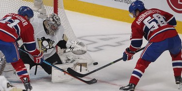 Penguins goalie Marc-Andre Fleury is surrounded by Montreal Canadiens' Brendan Gallagher, left, and Sven Andrighetto, during second period NHL action in Montreal on Saturday January 10, 2015. (Pierre Obendrauf / MONTREAL GAZETTE)