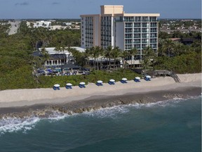 Rooms at Jupiter Beach Resort & Spa have a  choice of views: the sea, or the town, which is particularly pretty at night.