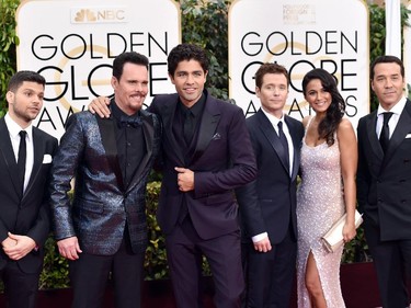 Jerry Ferrara, from left, Kevin Dillon, Adrian Grenier, Kevin Connolly, Emmanuelle Chriqui and Jeremy Piven arrive at the 72nd annual Golden Globe Awards at the Beverly Hilton Hotel on Sunday, Jan. 11, 2015, in Beverly Hills, Calif.