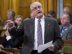 Veterans Affairs Minister Julian Fantino responds to a question during question period in the House of Commons Thursday December 4, 2014 in Ottawa.