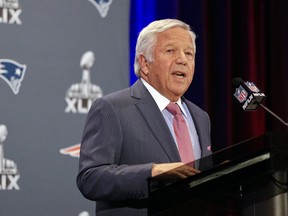 New England Patriots owner Robert Kraft reads a statement during a news conference Monday, Jan. 26, 2015, in Chandler, Ariz. The Patriots play the Seattle Seahawks in NFL football Super Bowl XLIX Sunday, Feb. 1, in Phoenix. (AP Photo/Mark Humphrey)