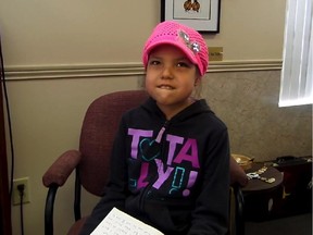 A still from a YouTube video showing 11-year-old Makayla Sault read her letter explaining why she has asked her parents to take her off chemotherapy and pursue traditional medicines instead.