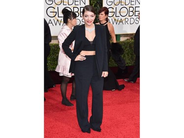 Lorde in black pantsuit with crop top, Neil Lane statement choker,