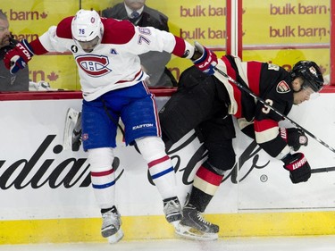 Montreal Canadiens defenseman P.K. Subban collides with Ottawa Senators defenseman Marc Methot along the boards during second- period action Thursday, Jan. 15, 2015, in Ottawa.