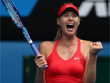 Maria Sharapova of Russia celebrates after defeating Eugenie Bouchard of Canada in their quarterfinal match at the Australian Open tennis championship in Melbourne, Australia, Tuesday, Jan. 27, 2015.