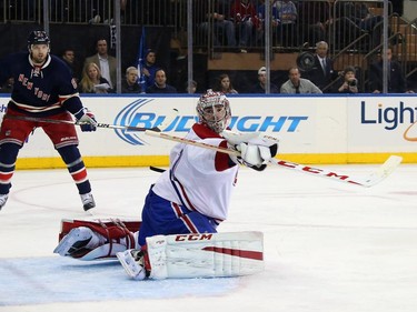 Carey Price (#31) of the Montreal Canadiens makes the second period save against the New York Rangers at Madison Square Garden on January 29, 2015 in New York City.