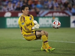 Goalkeeper Troy Perkins #1 of the Montreal Impact makes a save against the the Colorado Rapids at Dick's Sporting Goods Park on May 24, 2014 in Commerce City, Colorado. The Rapids defeated the Impact 4-1.