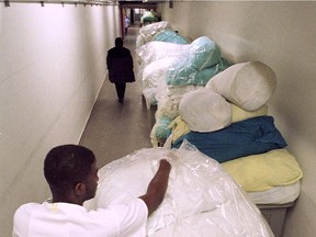 Laundry is transported through the corridors of a hospital.
