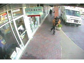 Surveillance video captured this image of  two suspects in the shooting of an SAQ employee in Baie-d'Urfe in October 2010.