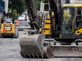 Construction vehicles around Cabot Square in Montreal, on Thursday, August 21, 2014.