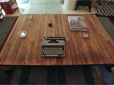A wooden table was made by artist Marc Gagnon.