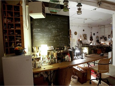 The office space with a blackboard is part of the 800-square-foot room.