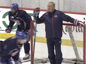 P.K. Subban, left, and head coach Michel Therrien  take a break during Canadiens practice at the Bell Sports Complex in Brossard on Jan. 5 2015.