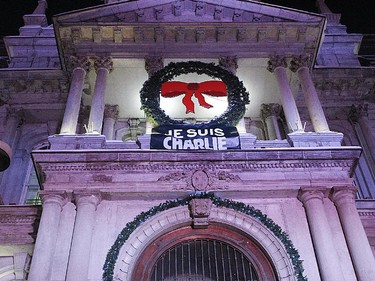 A  vigil was organized by Montreal City Hall on Wednesday night in support of the victims of the terrorist attack in Paris. A large banner Je suis Charlie has been installed at the top of Montreal City Hall in support of the Charlie Hebdo's victims.