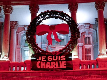 Hundreds of people braved the cold during a vigil organized by Montreal City Hall on Wednesday night in support of the victims of the terrorist attack in Paris. A large banner saying Je suis Charlie was installed at the top of city hall in memory of Charlie Hebdo's victims.