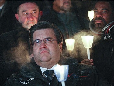Montreal mayor Denis Coderre was among the supporters who braved the cold during a  vigil organized by Montreal City Hall on Wednesday night in support of the victims of the terrorist attack in Paris. A large banner Je suis Charlie has been installed at the top of Montreal City Hall in support of the Charlie Hebdo's victims.