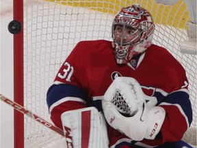 Canadiens goalie Carey Price looks at flying puck going past him during game against the Pittsburgh Penguins on Jan. 10, 2015 at the Bell Centre.