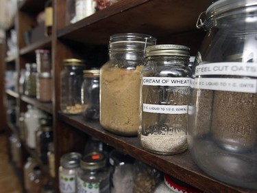 Labelled mason jars on shelves just outside the kitchen.