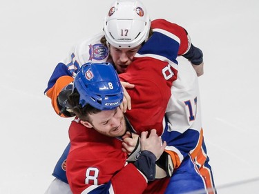 Montreal Canadiens right wing Brandon Prust exchanges punches with New York Islanders left wing Matt Martin during the first period at the Bell Centre on Saturday, Jan. 17.