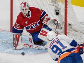 New York Islanders centre John Tavares makes a shot against Montreal Canadiens goalie Dustin Tokarski during the first period at the Bell Centre on Saturday, Jan. 17.