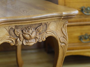 The carved furniture decorates one of the bedrooms, inherited from Hélène's family.
