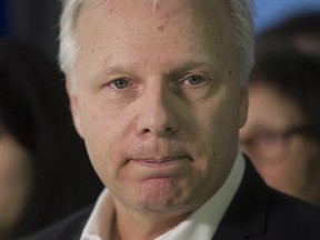 Rosemont MNA Jean-François Lisée, ponders question from reporters at the Parti Québécois offices. Lisée  announced he's dropping out of Parti Québécois leadership race on Friday January 23, 2015.