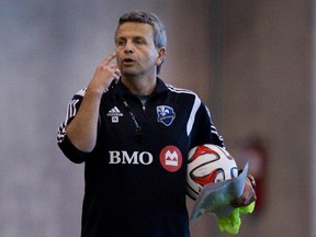 MONTREAL, QUE.: JANUARY 27, 2014--Head coach Frank Klopas, left. gives instructions to players during the Montreal Impact traing camp in Montreal on Monday January 27, 2014.  (Allen McInnis / THE GAZETTE)  ORG XMIT: 49055