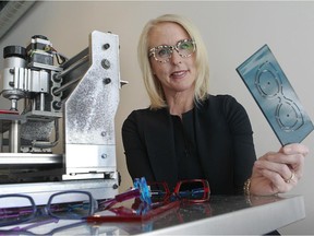 Marie-Sophie Dion does custom eyeglass frames in her lab at Marie-Sophie Dion Opticienne shop in St-Lambert. She uses large sheets of acetate from which the frames are cut from.