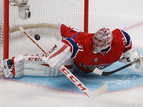 Carey Price of the Montreal Canadiens makes a save against Jamie Benn of the Dallas Stars in the second period of an NHL game at the Bell Centre in Montreal Tuesday, January 27, 2015.