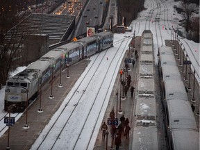 Passengers board AMT trains at the Lucien-L'Allier station in Montreal in 2013.