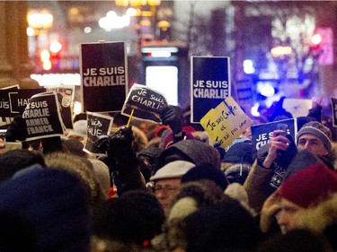 A crowd of several thousand people participate in a candle light vigil outside the French Consulate in Montreal on Wednesday January 7, 2015. Montrealers gathered in support of the victims of the terrorist attack on Charlie Hebdo in Paris earlier today that left 12 people dead and 11 injured.