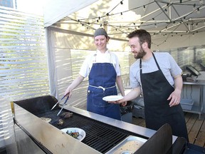 Chefs Michelle Marek and Seth Gabrielse at work on the rooftop Foodlab terrace in 2013.